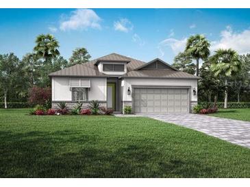 One-story home with gray roof and landscaping at 1681 Andover Ridge Dr, Deland, FL 32720