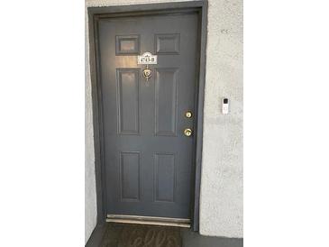 Gray front door with building number 4743-B at 4743 S Texas Ave # 4743B, Orlando, FL 32839