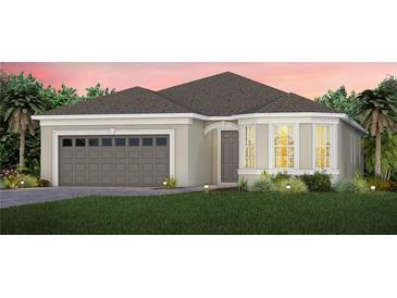 One-story home with gray exterior, two-car garage and bay window at 2609 Del Webb Dr, Minneola, FL 34715