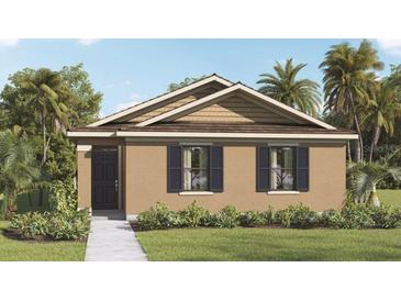 One-story home with tan siding and dark gray roof at 1664 Hummingbird Rd, Winter Haven, FL 33884