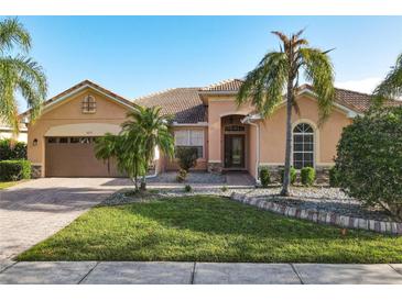 Single-Gathering home with a two-car garage and attractive landscaping at 3623 Weatherfield Dr, Kissimmee, FL 34746
