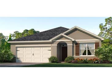 Single-story home with 2-car garage and landscaping at 7121 Carib Grackle Dr, Saint Cloud, FL 34773