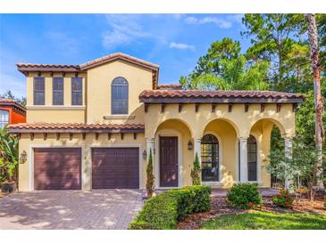 Two-story Mediterranean home with a two car garage at 600 Via Chris Ct, Debary, FL 32713