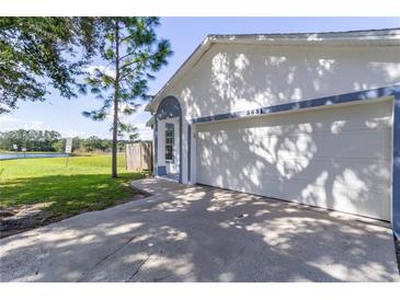Attached garage with ample parking space at 5631 La Joya Ct, Orlando, FL 32808