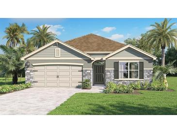 One-story home with stone accents and a two-car garage at 33472 Copper Hill Way, Sorrento, FL 32776