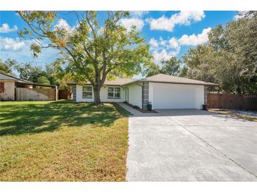 Updated single story home with driveway at 1213 Baranova Rd, Ocoee, FL 34761