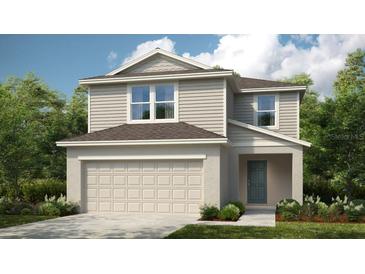 Two story home with gray siding and a teal door at 5736 Le Marin Way, Kissimmee, FL 34758