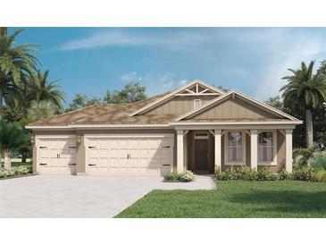 Two-story home with a two-car garage at 1771 Three Bars Rd, Kissimmee, FL 34744