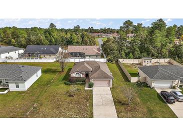 Aerial view showcasing the house and surrounding neighborhood at 2713 Sw 158Th St, Ocala, FL 34473