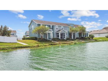 Waterfront townhouses with screened porches and lake views at 559 Juniper Springs Dr, Groveland, FL 34736