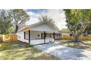 Charming one-story home with a covered porch and well-maintained yard at 280 Westwood Ave, Winter Haven, FL 33880