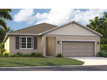 One-story house with a two-car garage and front yard at 3577 Dahlia Dr, Lake Hamilton, FL 33851