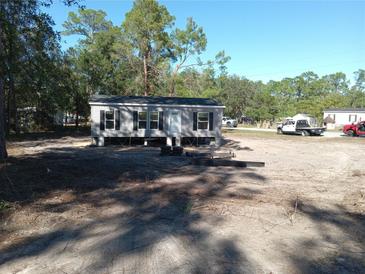 Newly constructed single-wide mobile home on a spacious lot at 31541 Hillcrest Dr, Eustis, FL 32736