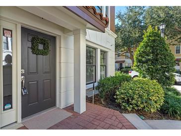 Inviting front door entrance with wreath and keypad at 4000 Messina Dr, Lake Mary, FL 32746