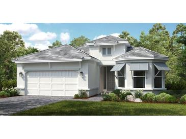 White two-story house with gray roof, shutters, and landscaping at 863 Arbor Green Trl, St Cloud, FL 34771