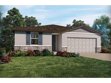 Charming single-story home with a landscaped front yard and attached garage at 1328 Oak Valley Dr, Auburndale, FL 33823