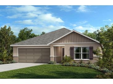 Single-story home with two-car garage and landscaped lawn at 3946 Axis Valley Pl, St Cloud, FL 34772