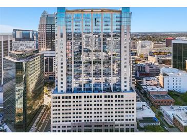 High-rise building in the city with modern architecture and city views at 155 S Court Ave # 1602, Orlando, FL 32801