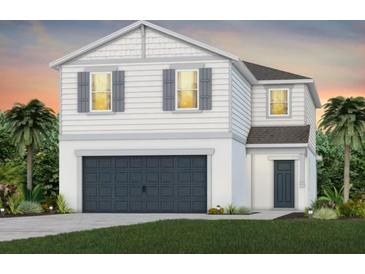 Two-story house with a gray-blue door and dark gray garage door at 3022 Norcott Dr, Davenport, FL 33837