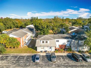 Aerial view of a community of homes with ample parking at 7309 Daniel Webster Dr # O-3A, Winter Park, FL 32792