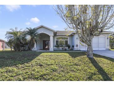 Single-story home with a large yard and screened garage at 839 Franconville Ct, Kissimmee, FL 34759