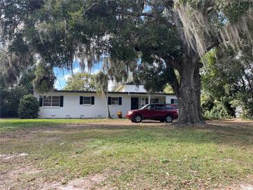 Ranch style home with carport and spacious yard at 116 Main St, Windermere, FL 34786