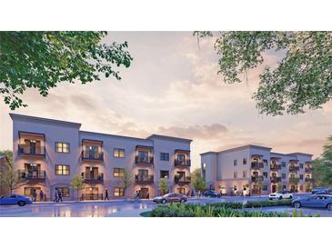 Modern apartment building exterior with parking and street view at 415 Se 1St Ave # 101-A, Ocala, FL 34471