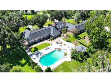 Brick home with pool and gazebo at 1321 Sw 42Nd St, Ocala, FL 34471