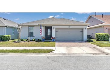 Single-story house with two-car garage at 5662 Nw 40Th Pl, Ocala, FL 34482