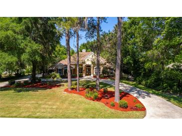 Single Gathering home with landscaped yard at 5038 Se 6Th Ave, Ocala, FL 34480