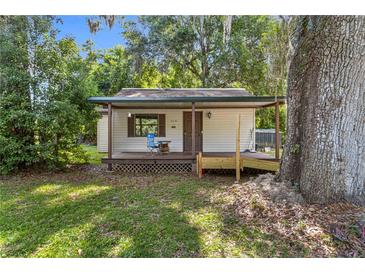 Cozy cottage with covered porch and ramp at 11531 Se 60Th Ave, Belleview, FL 34420