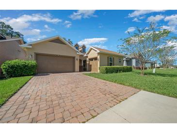 Two-story house with a brown garage door at 3396 Nw 55Th Ct, Ocala, FL 34482