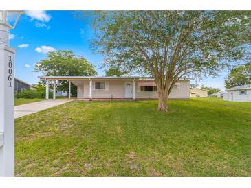 Single story house with carport and large yard at 10061 Sw 88Th Ter, Ocala, FL 34481