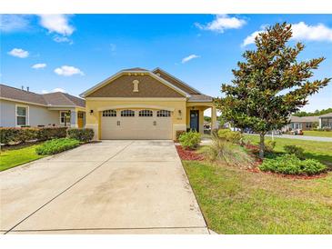 Exterior view of two-car garage and driveway at 9818 Sw 99Th Loop, Ocala, FL 34481