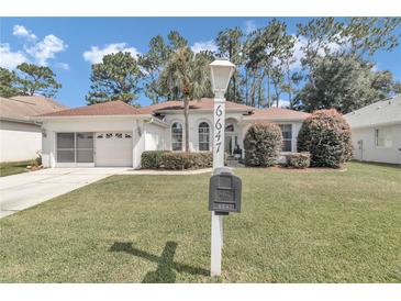 Photo one of 6647 Sw 113Th Pl Ocala FL 34476 | MLS OM683112