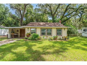 Charming single story home with a well-manicured lawn at 12369 Se 130Th Ct, Ocklawaha, FL 32179