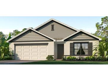 One-story home with gray siding, white garage door, and black shutters at 4758 Sw 88Th St, Ocala, FL 34476