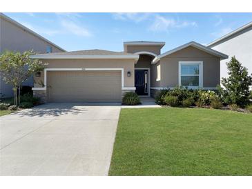 Modern single-story home with a two-car garage at 5584 Sw 43Rd Ct, Ocala, FL 34474