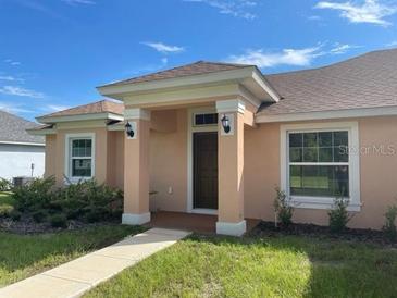 Charming one-story home with front porch at 2030 Sw 163Rd Pl, Ocala, FL 34473