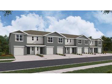 Modern townhouses with attached garages and attractive landscaping at 6616 Sw 81St Loop, Ocala, FL 34476