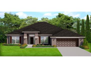 One-story home with brown roof, landscaping, and a two-car garage at 11503 Sw 65Th Avenue Rd, Ocala, FL 34476