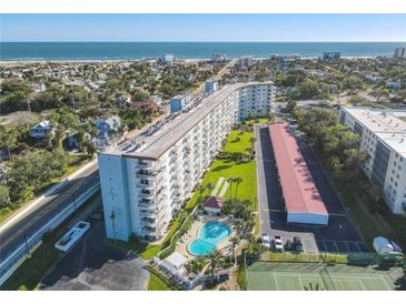 Oceanfront building with pool, tennis court, and parking at 100 Silver Beach Ave # 304, Daytona Beach, FL 32118