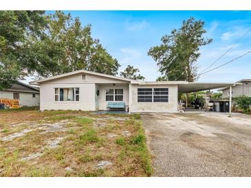 One-story house with carport and mature trees at 120 2Nd St # Jpv, Winter Haven, FL 33880