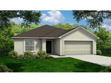 One-story house with a brown roof and attached garage at 221 Harper Estates Cir, Lake Wales, FL 33859