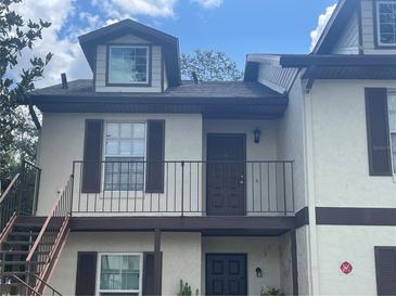 Two-story condo building with private entrance and balcony at 600 Northern Way # 108, Winter Springs, FL 32708