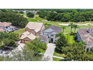 Two-story home with a golf course view at 1217 Radiant St, Reunion, FL 34747