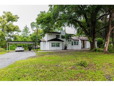 Newly renovated home with carport and spacious yard at 1419 36Th St, Orlando, FL 32839