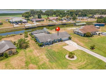 Aerial view of canal front home at 720 Shore Drive, Kissimmee, FL 34744