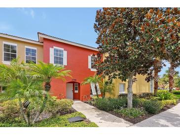 Two story townhome with attractive landscaping at 2758 Sun Key Pl, Kissimmee, FL 34747