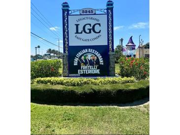 Sign for Legacy Grand East Gate Condo community at 5245 W Irlo Bronson Memorial Hwy # 234, Kissimmee, FL 34746